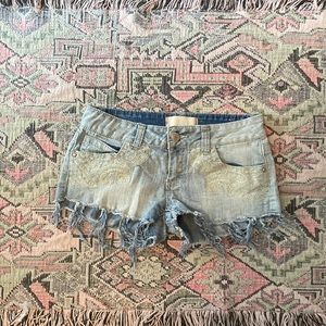 Almost Famous, light wash, fringe, frayed, paisley embroidered, low rise, shorts